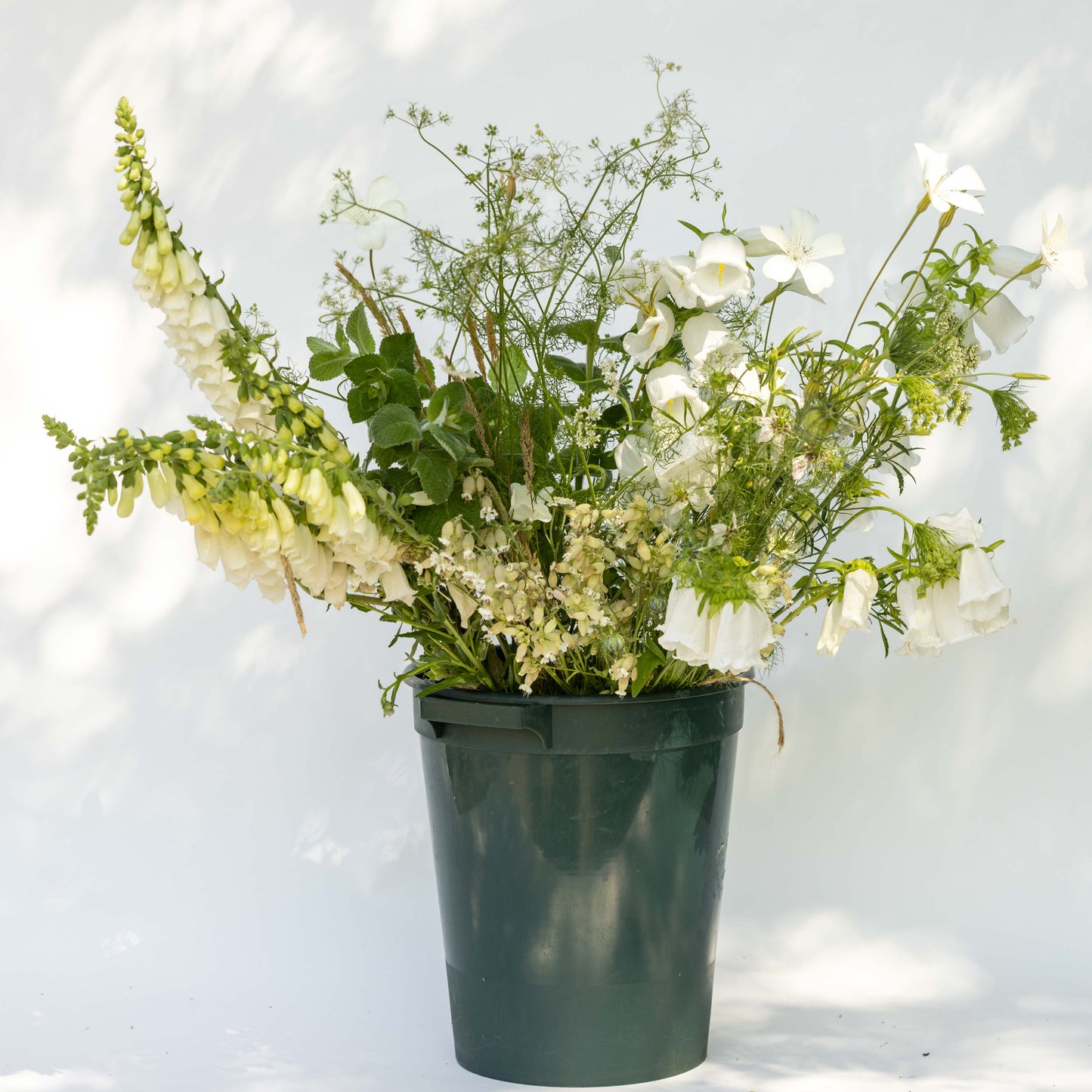 Florist's bucket of seasonal flowers